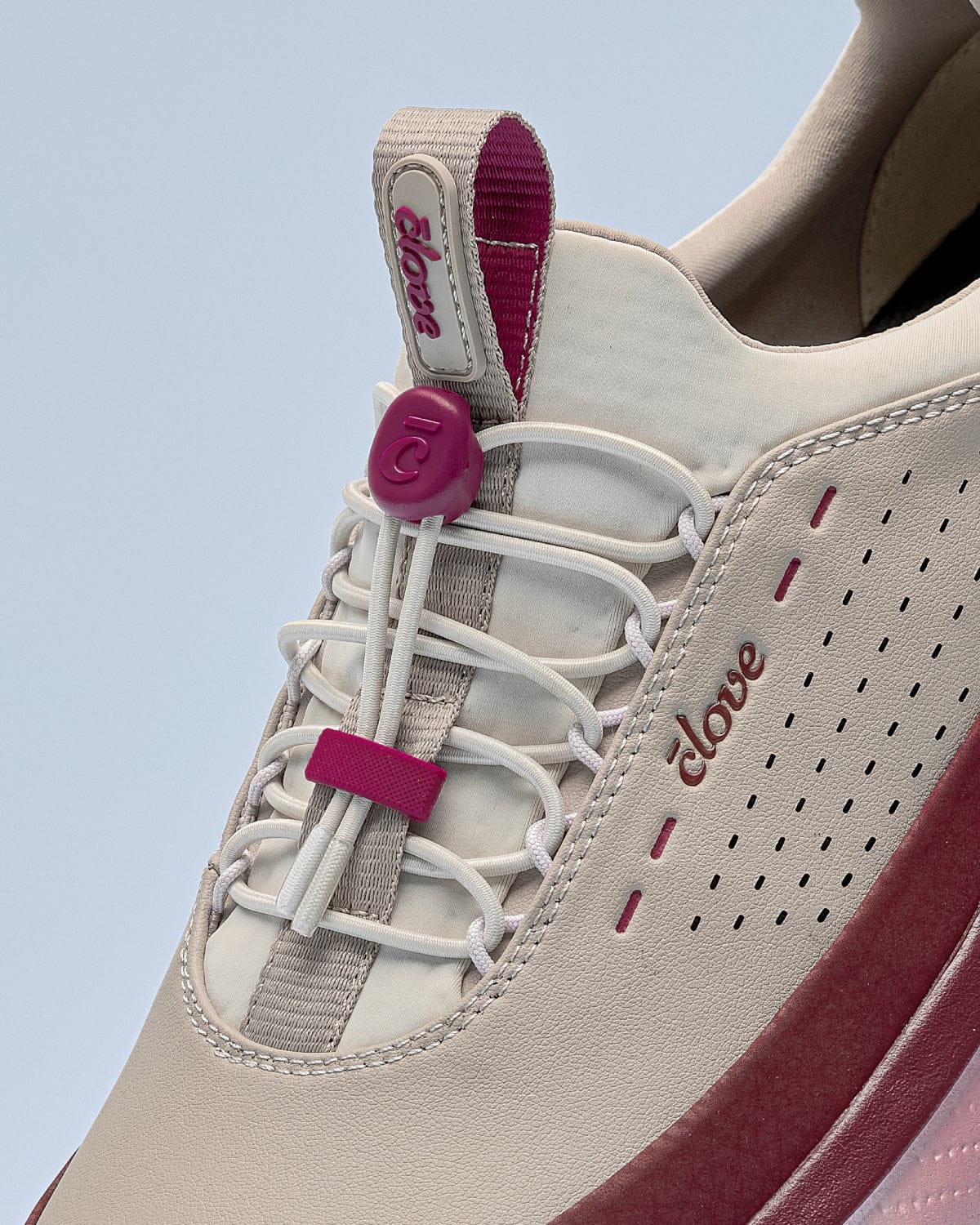 forte-2-burgundy-tan_Laces_Grey_Background_Zoomed_In_Clarino_Material