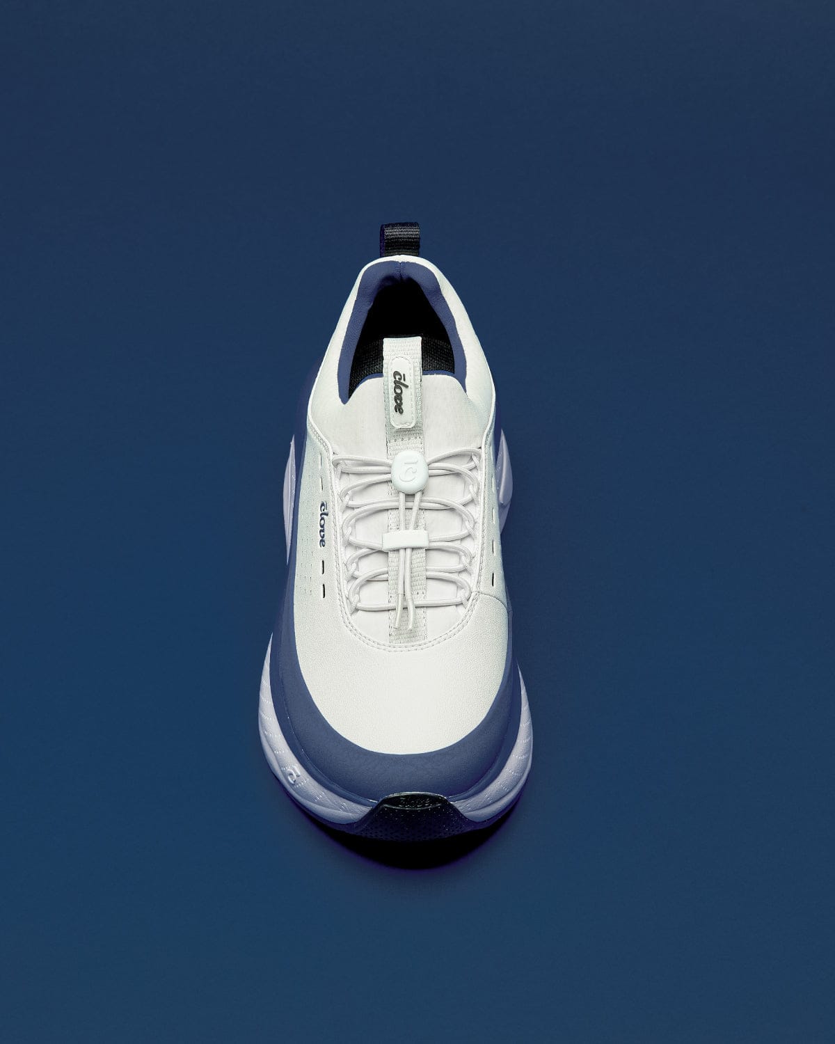 forte-2-white-navy_Blue_Background_Nose_View_Laces_Clarino_Material