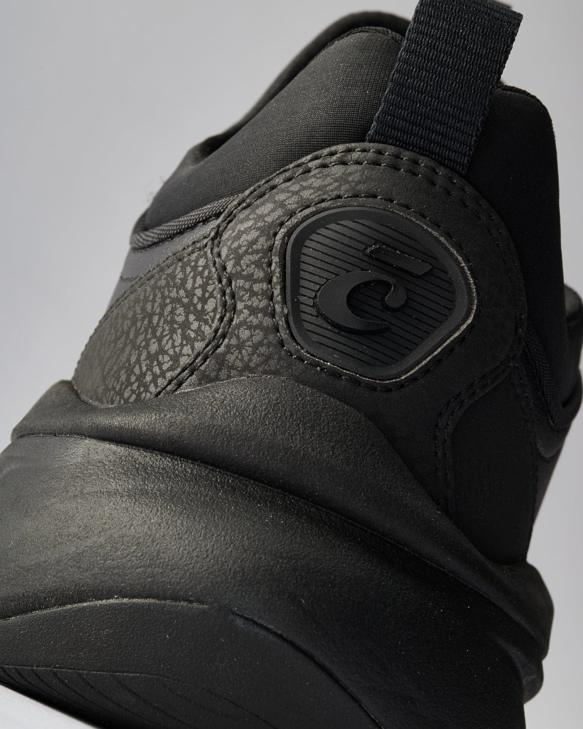 prima-all-black-option_Zoomed_In_Backview_Clarino_GreyBackground